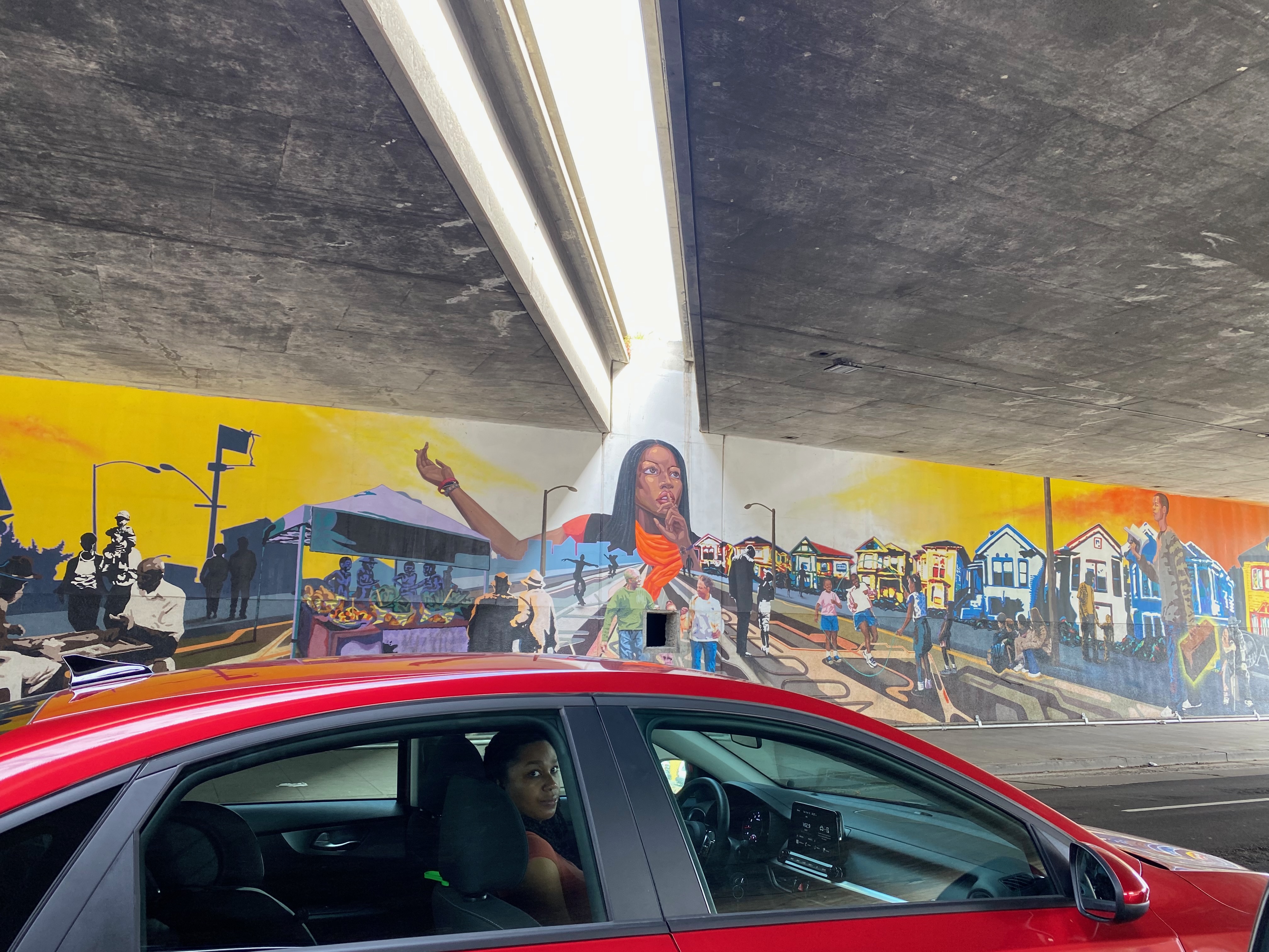 mural with driver — photograph by A.B. Quine